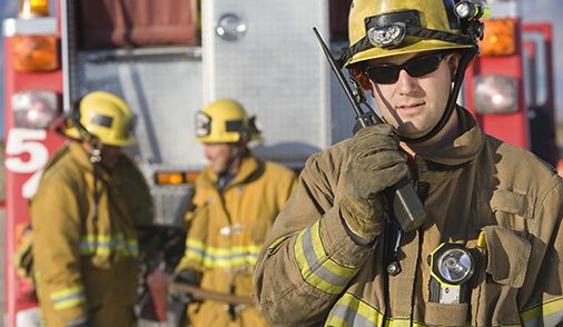 Firefighters pictured, representing Unified Communication for Emergency Response Systems